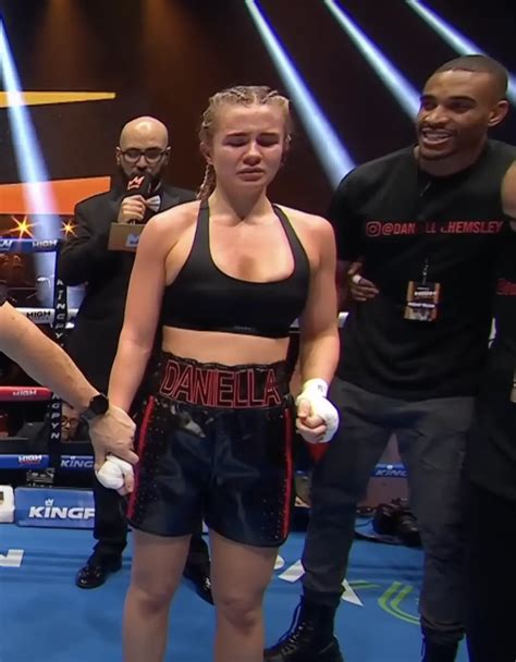 boxing girl flashes crowd after win|Kingpyn Boxing video: Daniella Hemsley flashes fans。